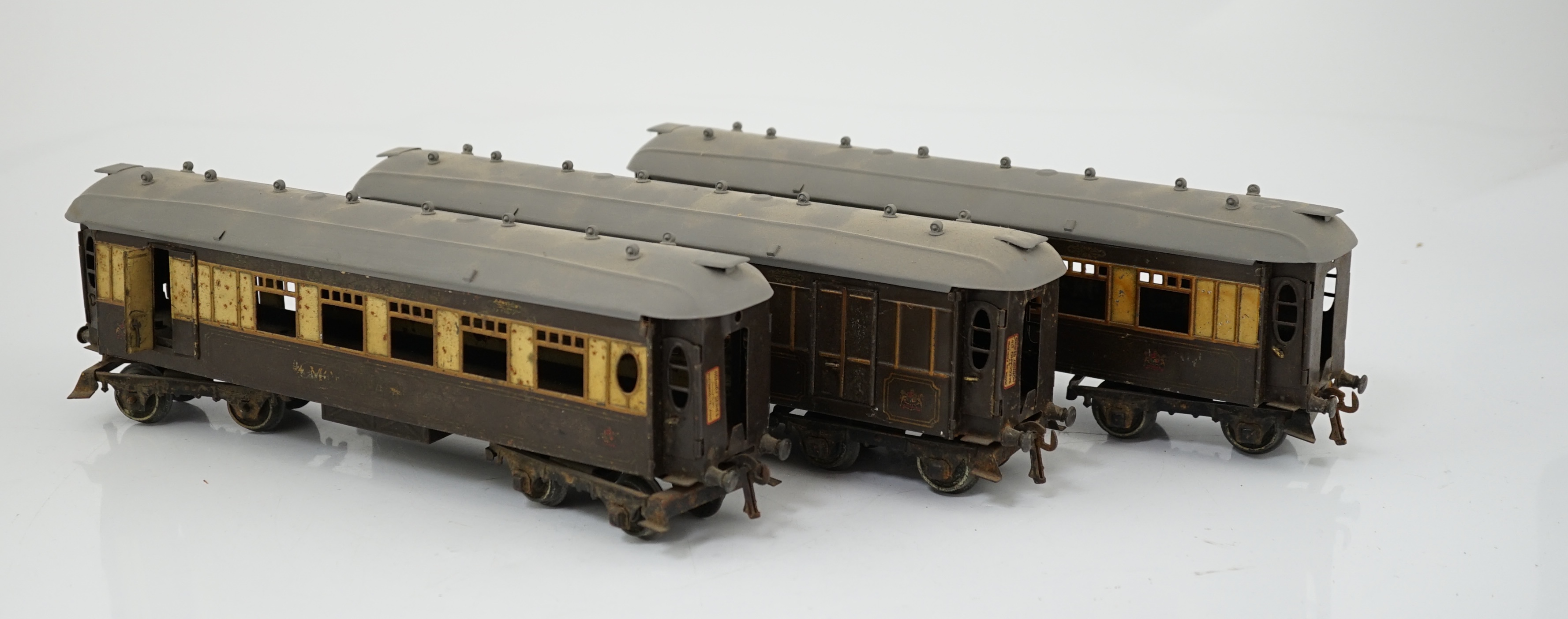 Three Hornby Series 0 gauge tinplate Pullman cars; Loraine, Arcadia and Montana